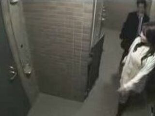 Get fucked in a Tokyo hotel room with a Nippon babe and her nipple clamps while watching XXX porn, all caught on camera!