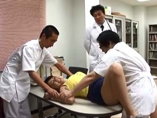Fucking a busty patient in a wild ride with three doctors in a hospital XXX