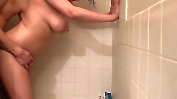 My boyfriend eats out my shaved pussy and fucks me hard standing up in the shower!